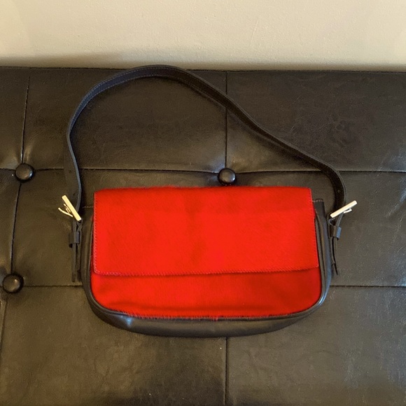 Roots faux pony bag. Red. 10.5 in x 6.5 in. Excellent condition. - Picture 1 of 3